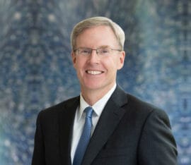 John E. Schmidtlein